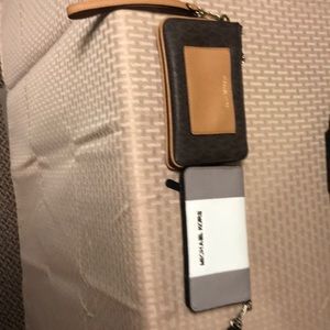 Michael Kors wrist clutches
